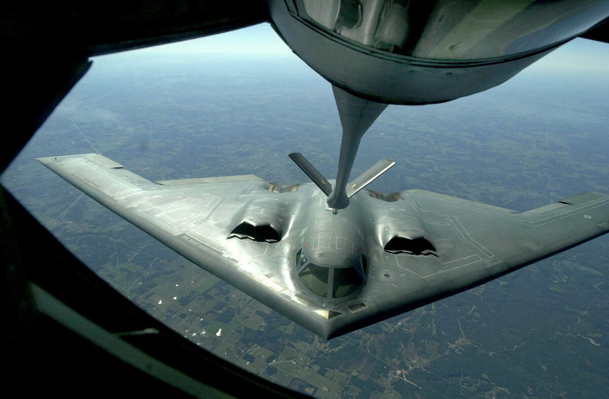 A B-2 Stealth Bomber approaches a KC135 tanker on a midair refueling operation over Missouri, Tuesday, Sept. 25, 2001. The exercise was being done by members of the Grand Forks, N.D. Air Force base. The bomber took on over 20,000 pounds of fuel. (AP Photo/Star Tribune, Richard Sennott)