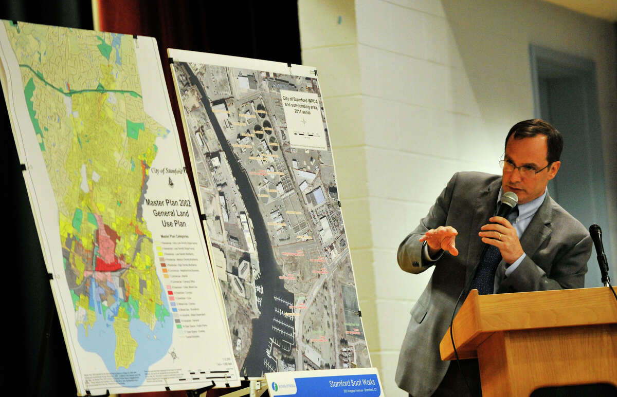 Joseph Capalbo, corporation counsel for the city, speaks during the public hearing in front of the Stamford Planning Board at Westover School in Stamford, Conn., on Tuesday, Aug. 13, 2013. The plan before the board is Building and Land Technology's proposal to shift a boatyard to Magee Avenue in order to make room for the hedge fund Bridgewater Associates to move into land on a peninsula on Bateman Way.