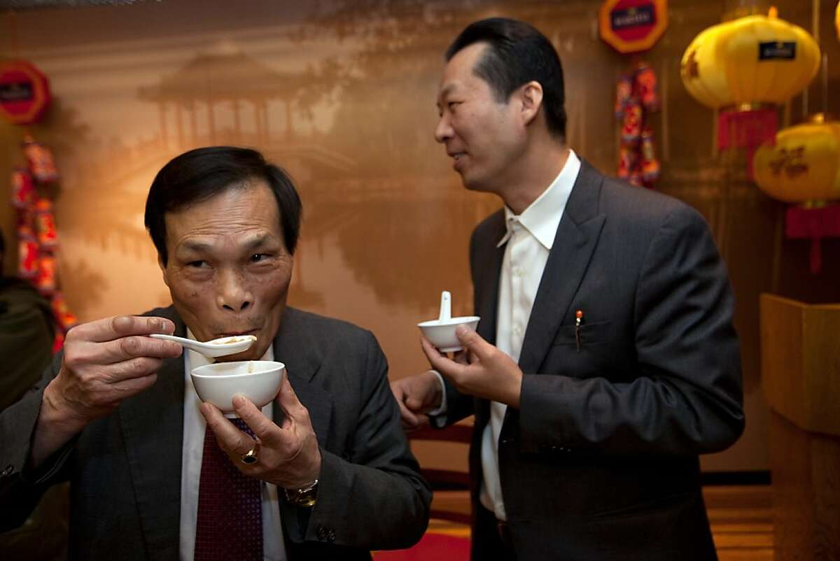 Huan Da Yu, a Chinese herbalist doctor (L) and David Lu (R) enjoy a bowl of shark fin soup at the conclusion of a press conference at the Far East Cafe regarding a bill that has been introduced by legislators to ban the possession, sale and distribution of shark fins used in a traditional Chinese soup on February 14, 2011 in San Francisco Calif. Photograph by David Paul Morris/Special to the Chronicle