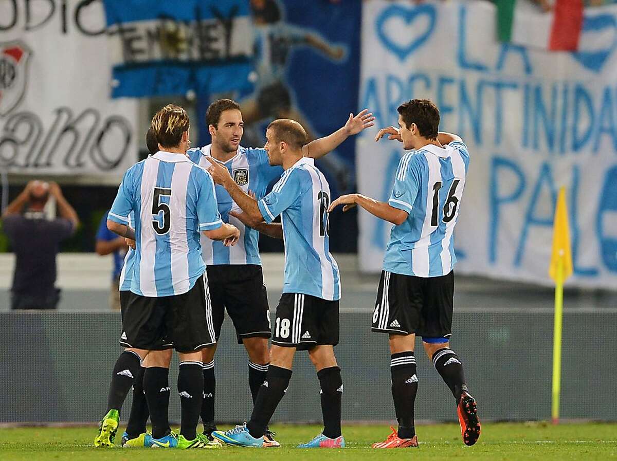 Argentina wins rare soccer matchup with Italy