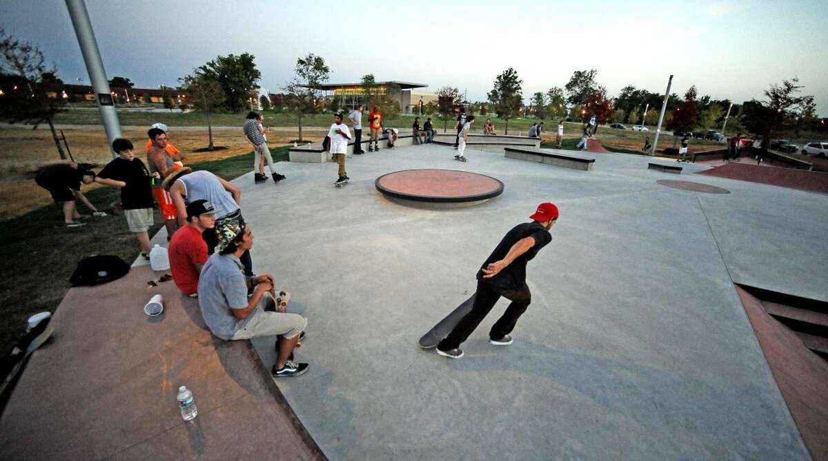 Locals and visitors enjoy the first official day at the Beautiful Mountain Skate Plaza on Tuesday, August 6, 2013. Photo taken: Randy Edwards/The Enterprise