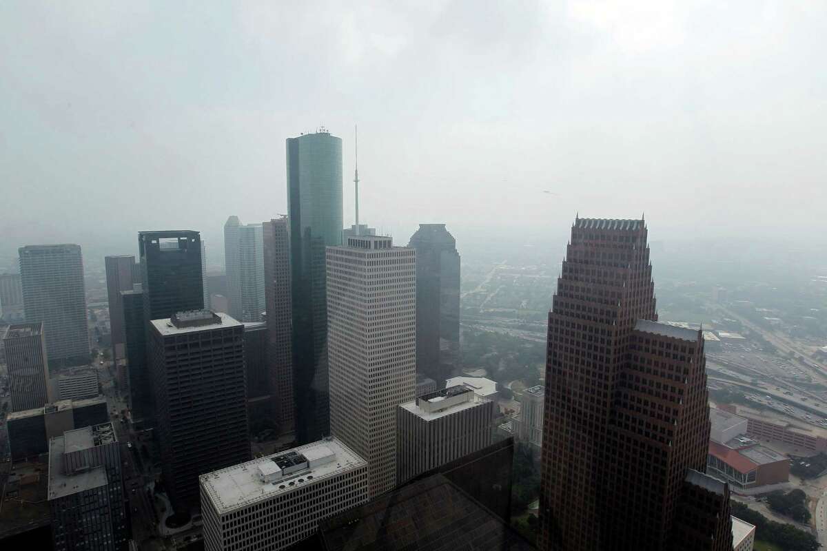 A haze fills the sky over downtown Houston. 