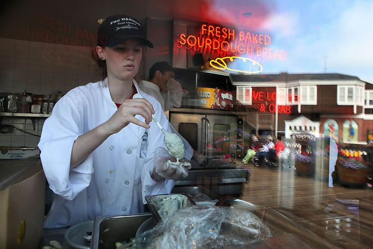 Line cook Hayley Smith preps baked oysters at Fog Harbor Fish House at Pier 39 in San Francisco, Calif., on Thursday, July 30, 2013.