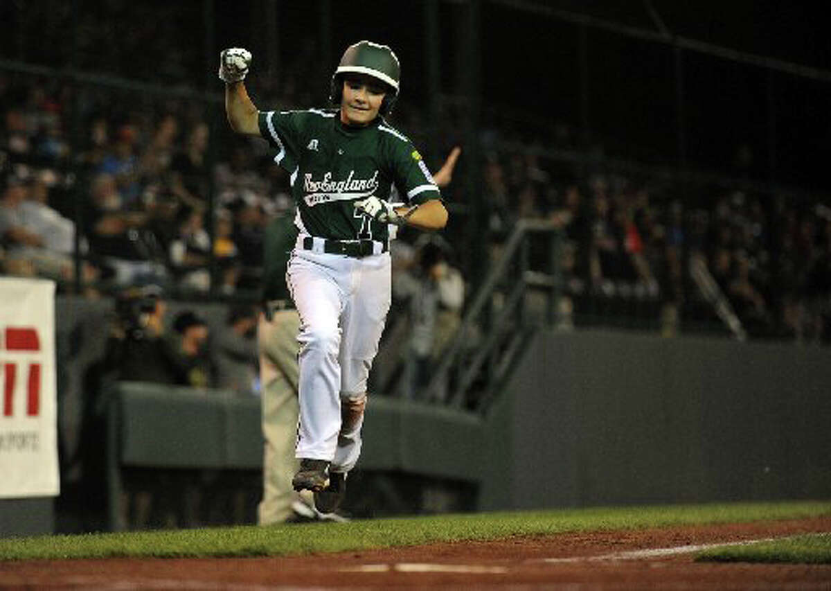 Westport's Chris Drbal, seen racing home with the winning run in Thursday night's World Series opener, and his mates will be back in action Sunday afternoon against the Northwest champions from Washington State.
