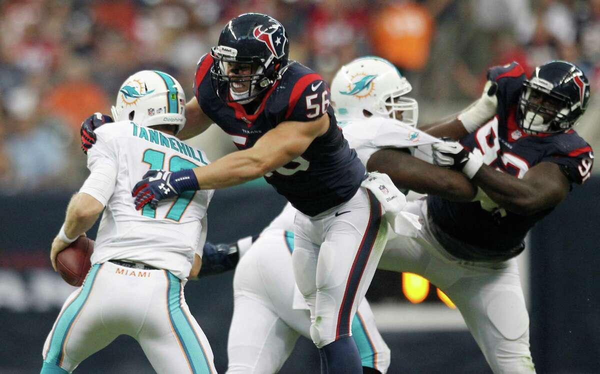 Linebacker Brian Cushing, right, trying to wrap up Dolphins QB Ryan Tannehill, took part in 10 plays and made one tackle.