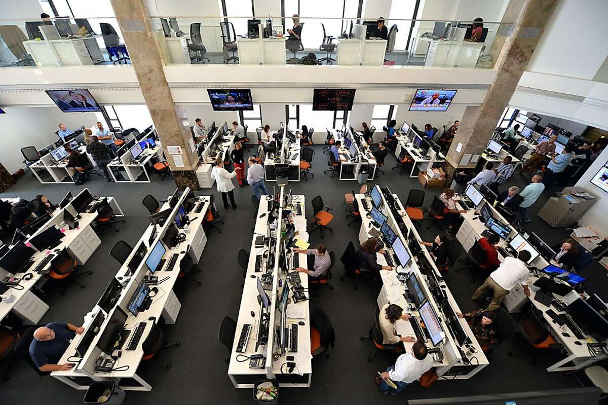 Centre right. Journalists in News Studio News.