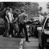 This 1994 archive photo shows East Greenbush police removing the body of Wilomeana "Violet" Filkins, who was killed in her Coventry Apartmentts residence. (Times Union archive)