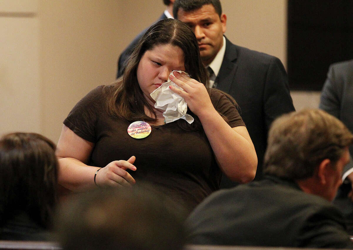 Priscilla Flores wipes away tears after addressing Jeffrey Eugene Theisen during the victim impact statement in the 399th District Court on Tuesday, Aug. 20, 2013. Theisen was determined to be guilty of intoxication manslaughter and in the death of Flores' mother Christina Renee Flores in 2011. Theisen crashed into Flores by going the wrong way on Interstate 37 while intoxicated.