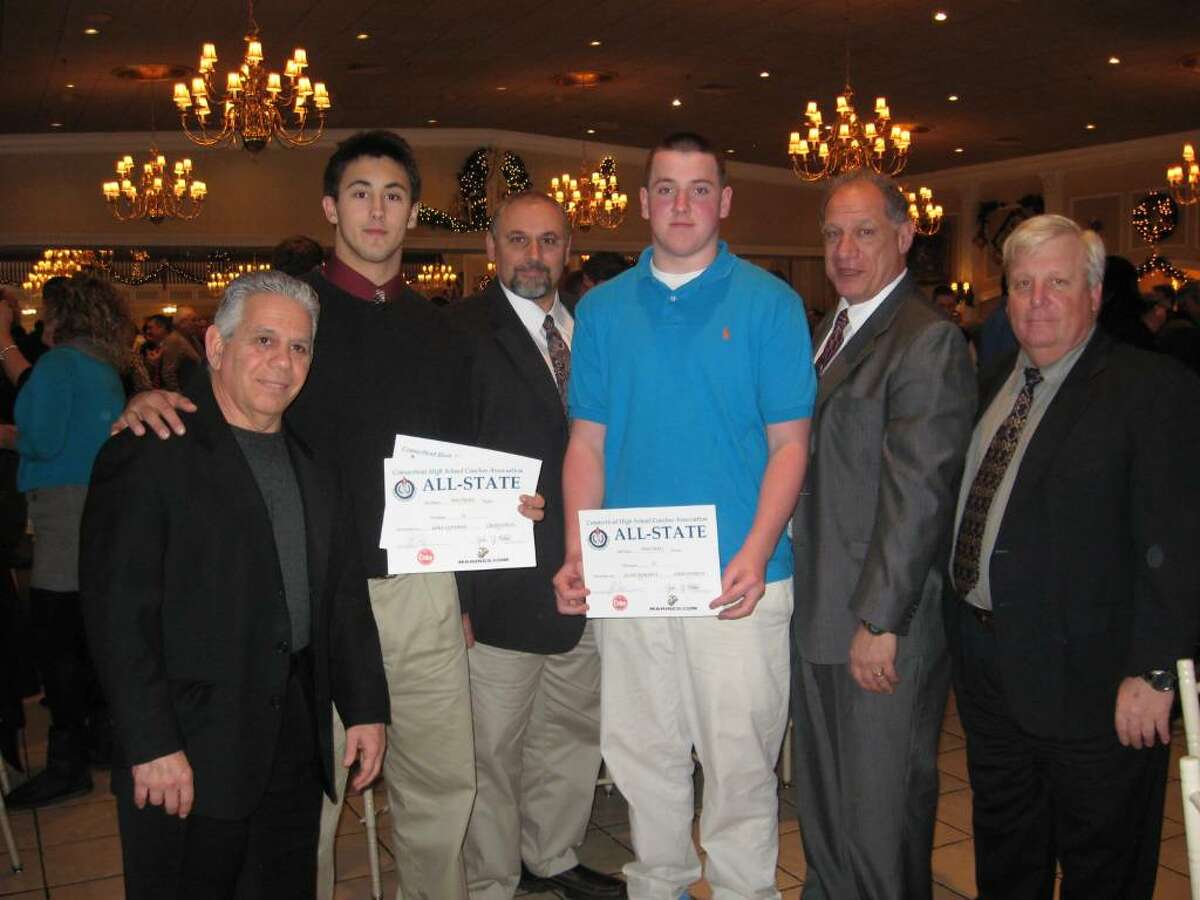 Greenwich High assistant coach Carl Cairo, quarterback Mike Lefflbine, assistant coach Bob Mata, defensive tackle Jim Barrett, head coach Rich Albonizio and assistant coach Steve Murphy are seen at the All-State Banquet at the Aqua Turf Club in Southington earlier this month. Lefflbine, Barrett and teammates Colin Dunster and James Utton were named to the Connecticut High School Coaches Association Class LL team.