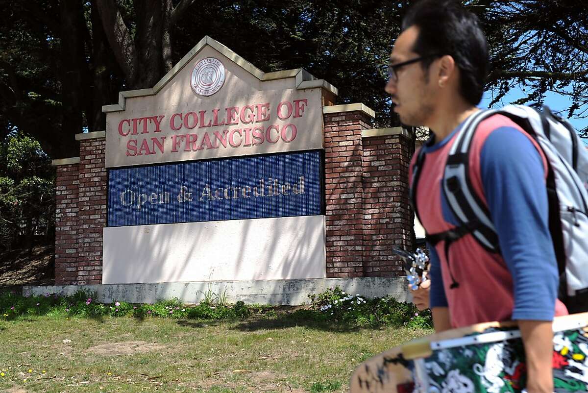The main sign in front of City College of San Francisco reads that the school is accredited and open for enrollment, in San Francisco, California on Thursday, August 22, 2013.
