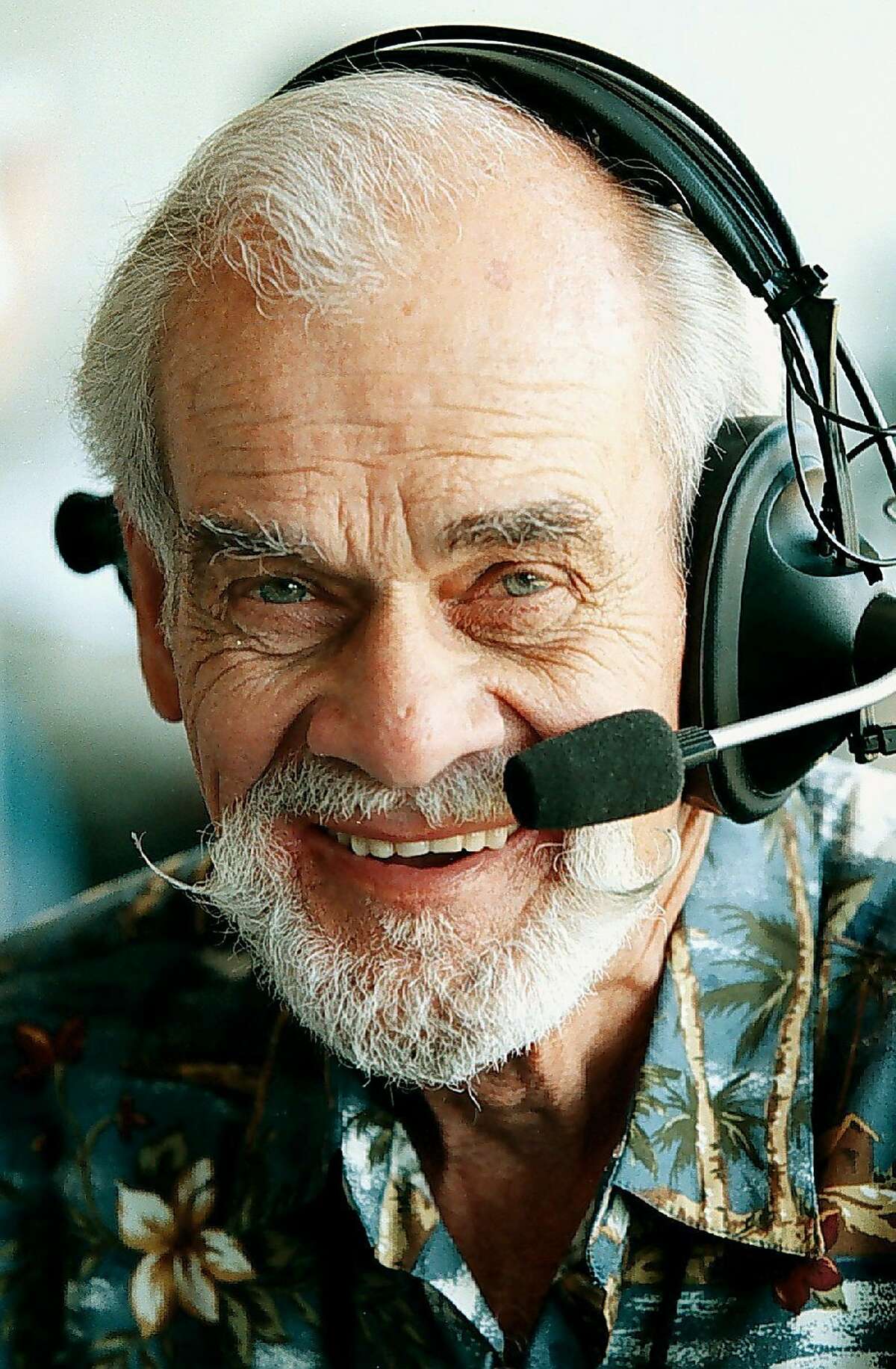 Longtime Oakland Athletics radio voice Bill King is shown in this photo taken Thursday, April 15, 1999, in Oakland Calif. King, whose signature call of "Holy Toledo!" was a household phrase for decades in the Bay Area, died early Tuesday, Oct. 18, 2005, from complications following hip surgery. He was 78.