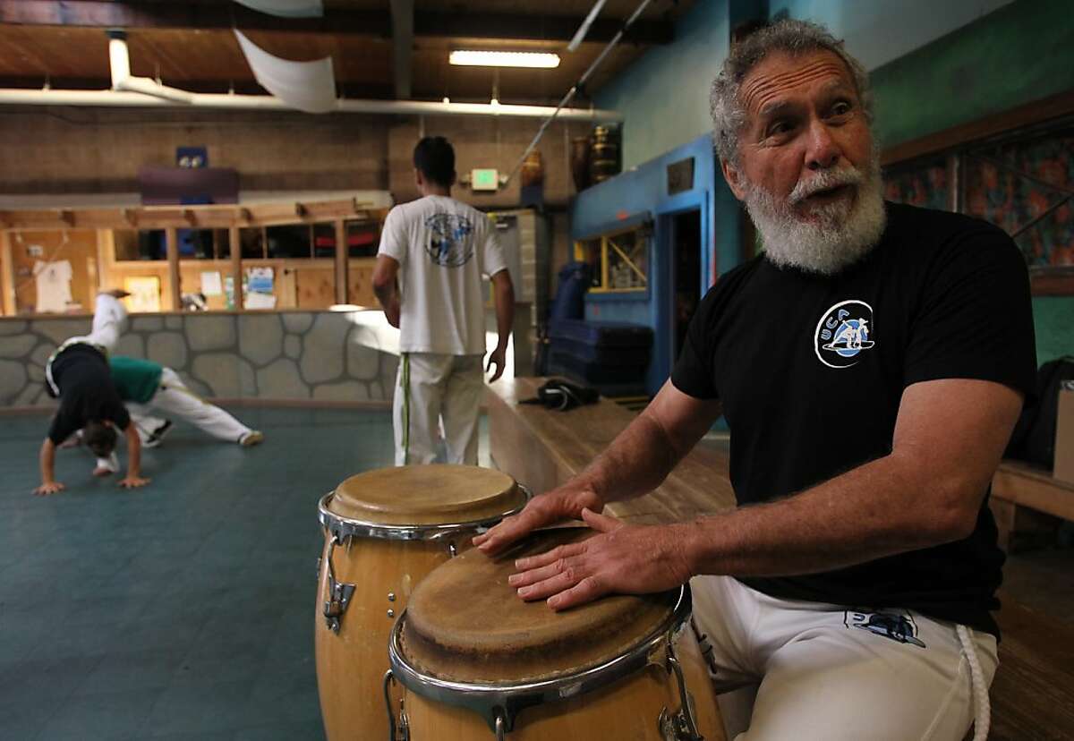 Mestre Acordeon drums for his students at Capoeira Arts Foundation in Berkeley, Calif. on Wednesday, August 21, 2013. Almeida and some of his students are riding bicycles from Berkeley to Brazil to raise money a charity for Brazilian children.