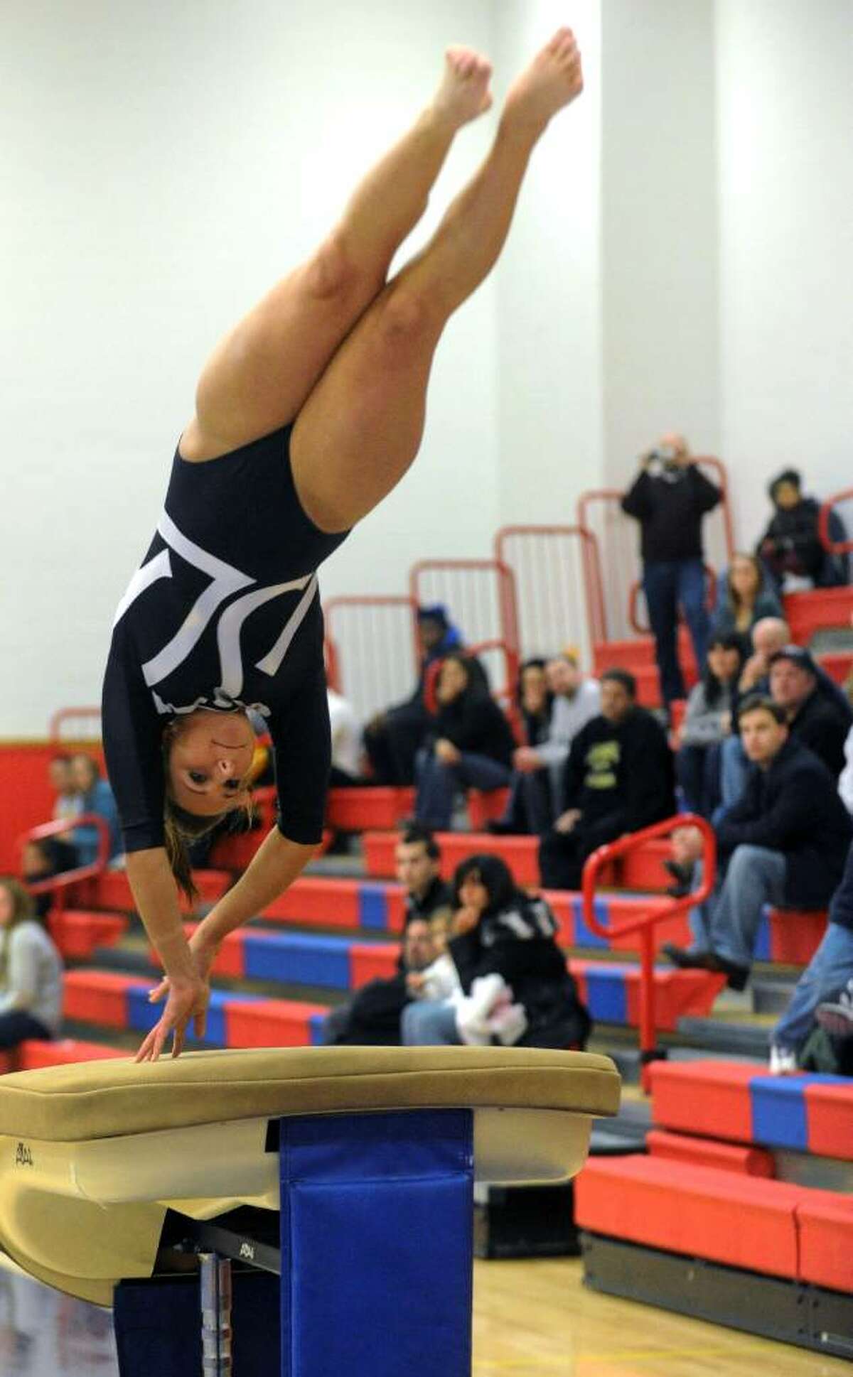 Jonthan Law's Grace Glennon performs on the vault, during gymnastics action against Foran High in Milford, Conn. on Thursday Jan. 21, 2009.