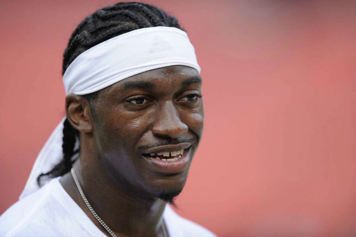 NFL's uniform police hits Robert Griffin III with a $10,000 fine,  apparently for 'Operation Patience' shirt