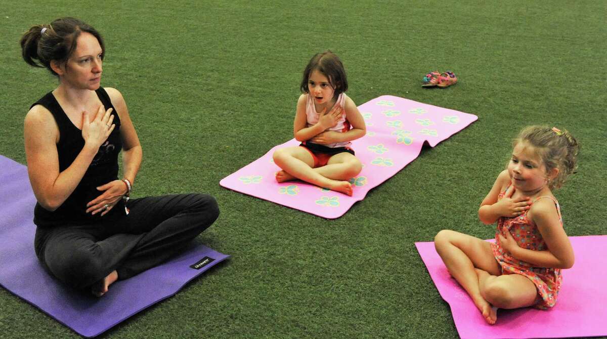 Hundreds gather at 2013 Newtown Yoga Festival