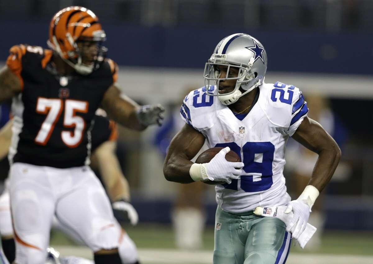 Cincinnati Bengals defensive tackle Devon Still (75) as Dallas Cowboys running back DeMarco Murray (29) finds running room during the second half of a preseason NFL football game, Saturday, Aug. 24, 2013, in Arlington, Texas. (AP Photo/LM Otero)