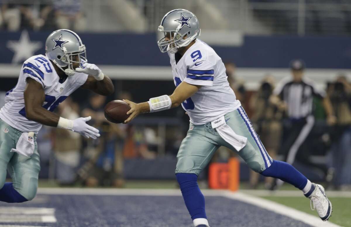 Dallas Cowboys quarterback Tony Romo (9) hands off to DeMarco Murray (29) during the first half of an preseason NFL football game, Saturday, Aug. 24, 2013, in Arlington, Texas. (AP Photo/LM Otero)