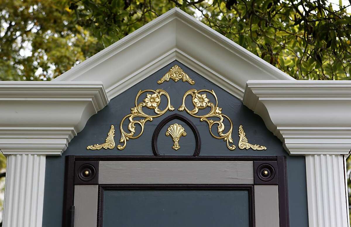 Fancy gold-colored details decorate a booth designed to disguise a porta-potty at a residential work site in San Francisco, Calif. on Thursday, Aug. 22, 2013.