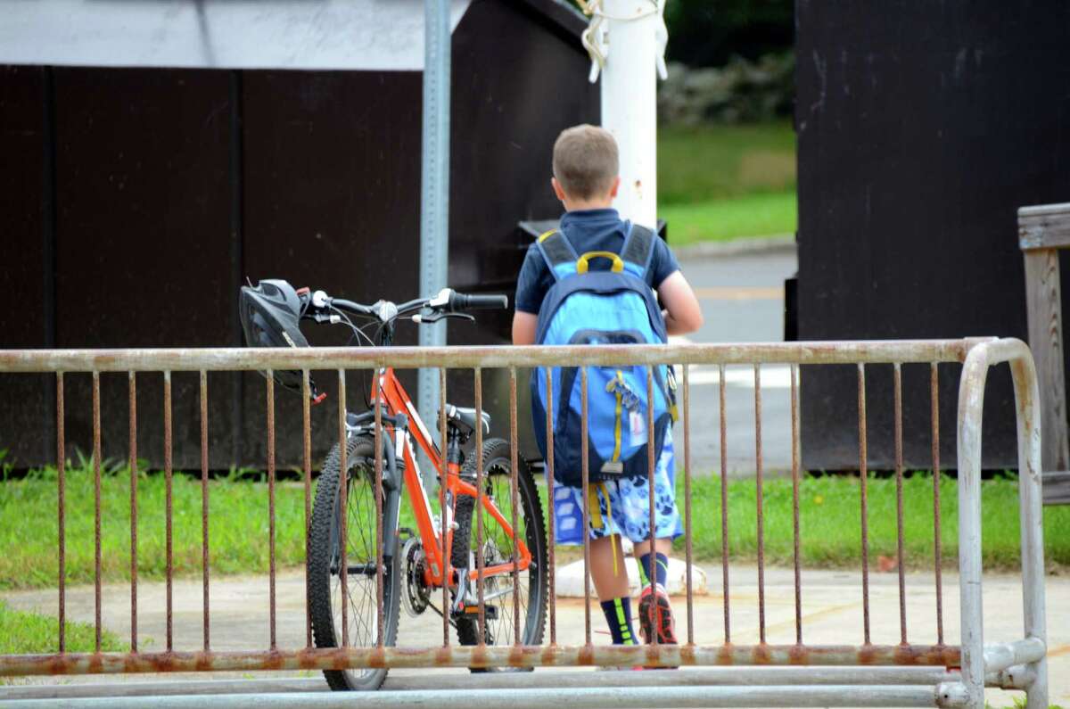 The first student at South School arrived by bicycle, on the first day of school, August 26, 2013, in New Canaan, Conn.