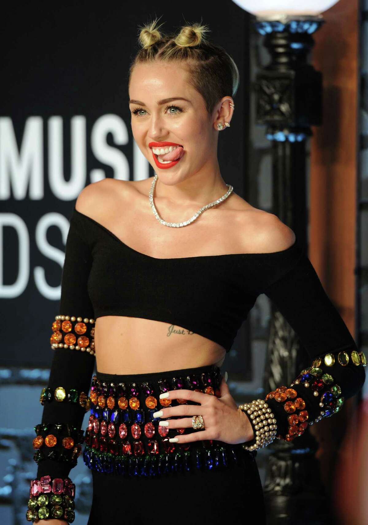 The world got more familiar than it wanted to with Miley Cyrus' tongue on Sunday at the MTV Video Music Awards. Here's a look at Miley and other Disney stars who are quite obviously all grown up.