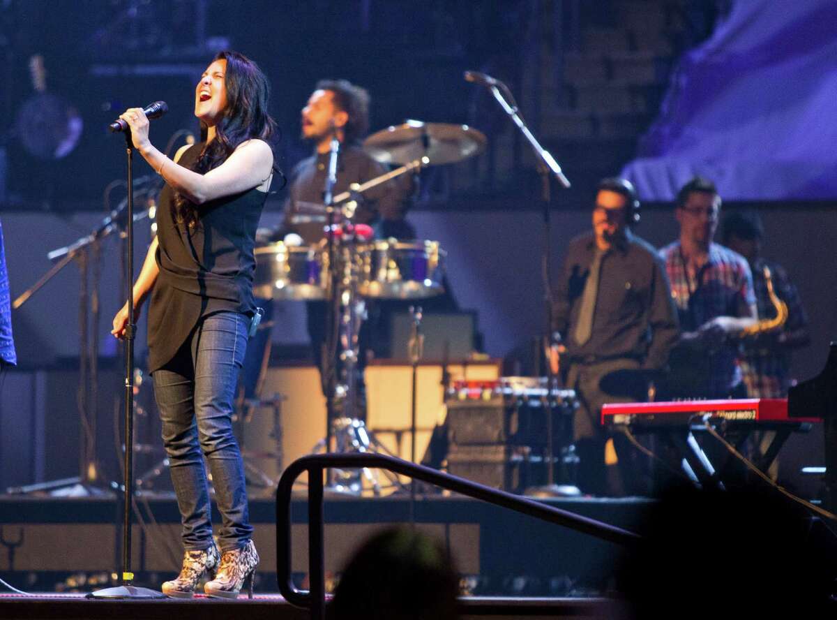 Jaci Velasquez and the band get Second Baptist Church Spanish language service started with a song, Sunday, May 5, 2013, in Houston. ( Nick de la Torre / Chronicle )