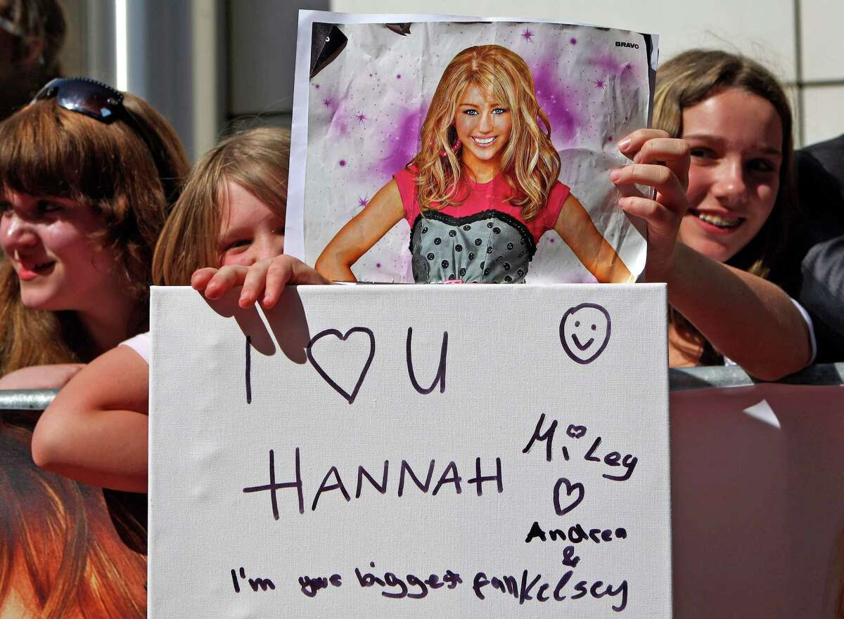Fans in Munich wait for the arrival of then-Disney sensation Miley Cyrus in 2009. What do these girls think of her now?