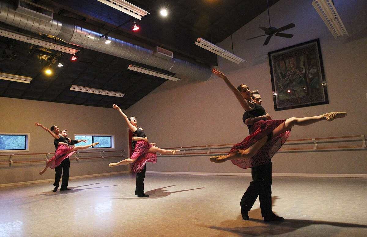 Dancers with Ballet Hispanico de San Antonio perform at an unveiling party at their studio. The dance company is overseen by Mayra Worthen.