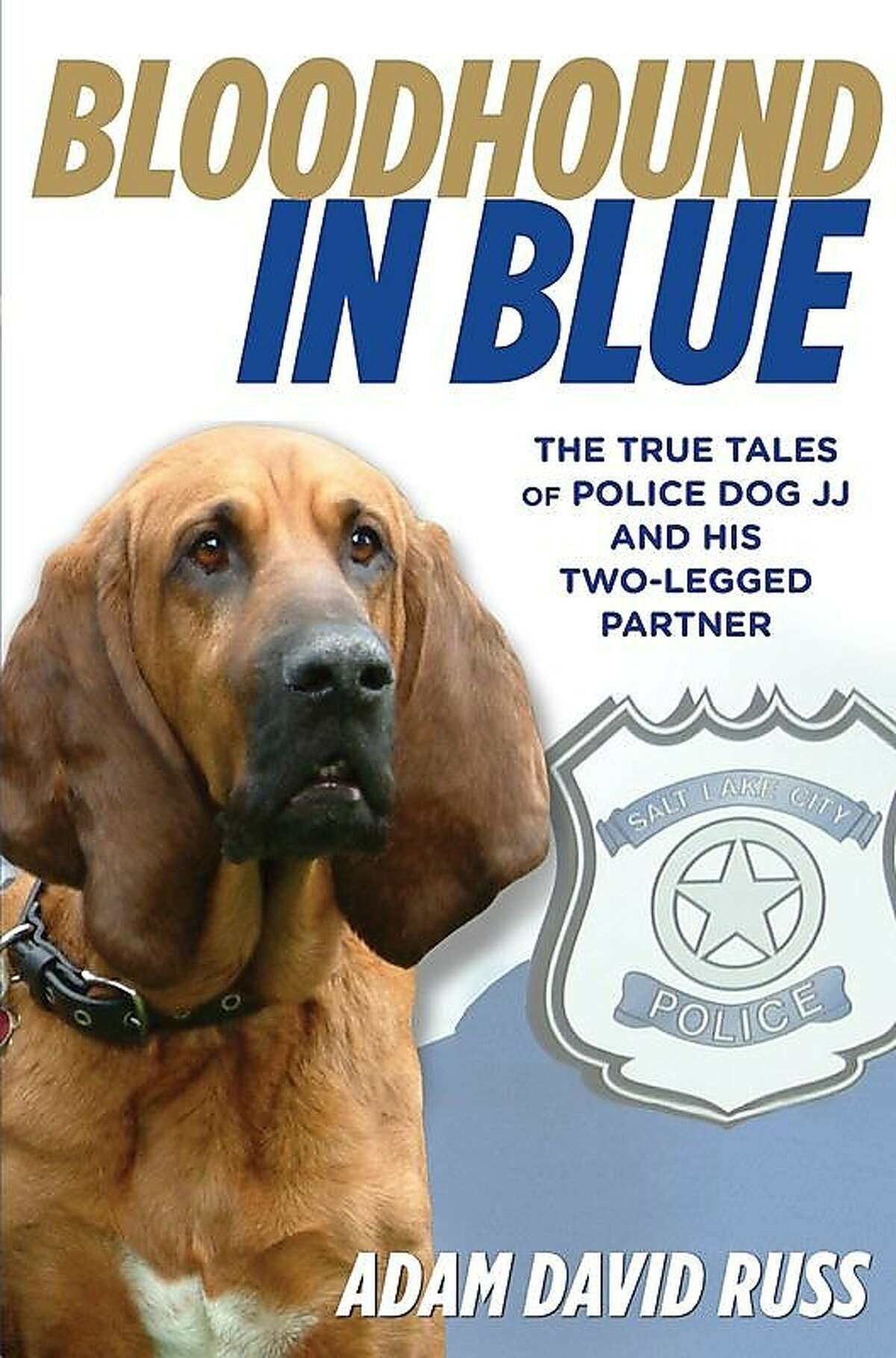 Local author Adam Russ's new book, "Bloodhound in Blue" chronicles the tales of heroic police dog JJ and his handler, Salt Lake City Police Officer Mike Serio.