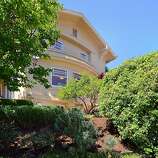 Grand Lake home has vibrant gardens, city views - SFGate