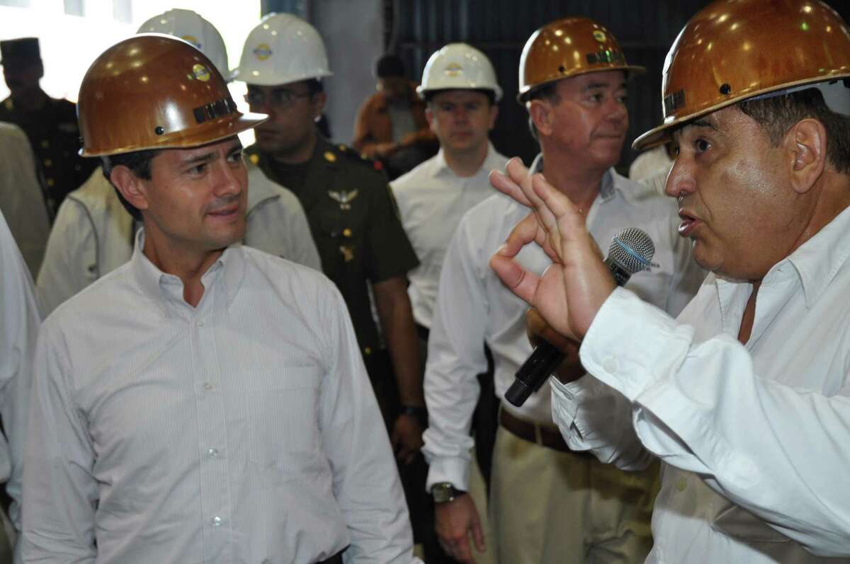 Mexican President Enrique Peña Nieto, left, and Alonso Ancira at the July 18 opening of Altos Hornos' steel plant. Peña Nieto is a member of the Partido Revolucionario Institucional, Ancira's favored political party.﻿