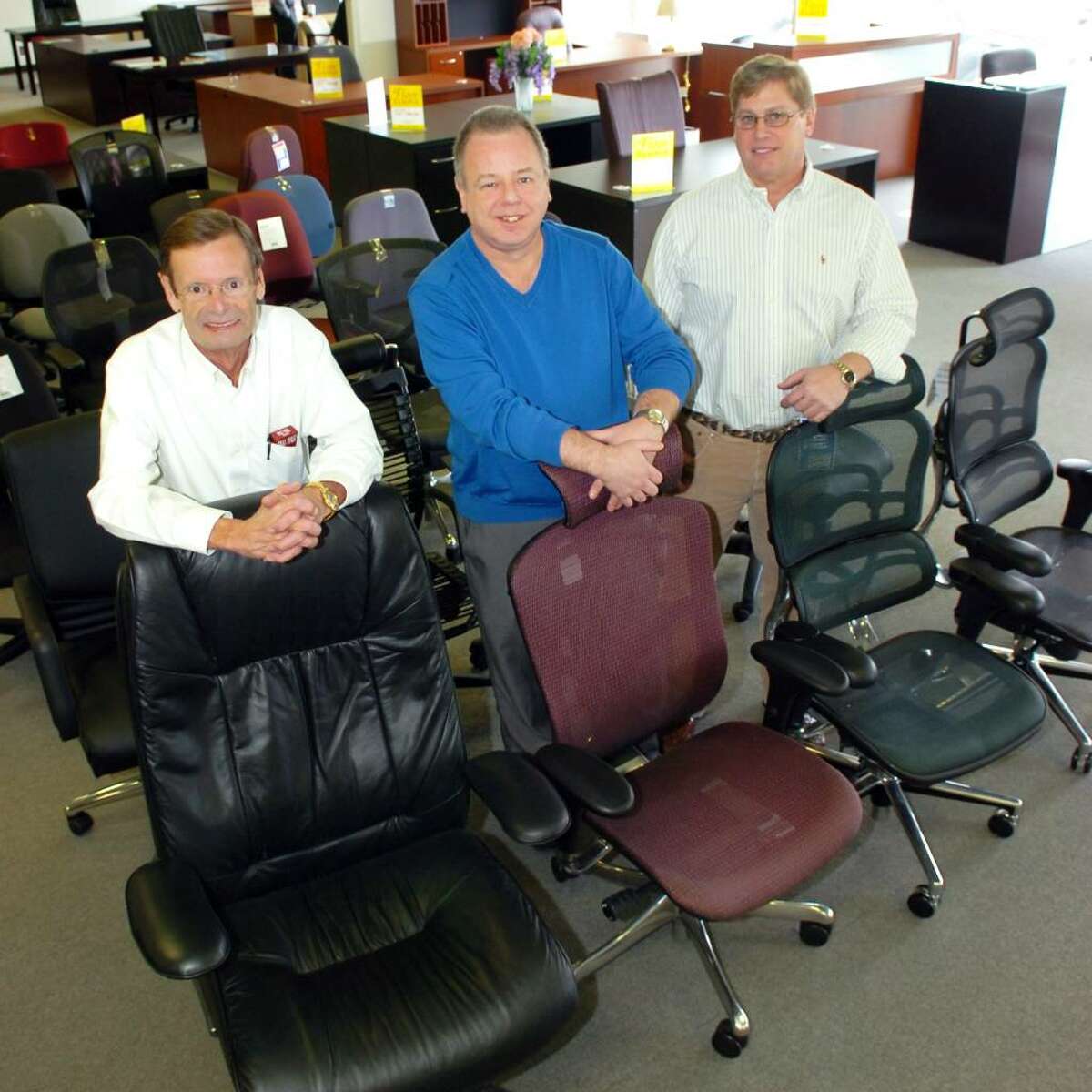 Universal Business Equipment, in Bridgeport, Conn. Jan. 13th, 2010. From left are owners Gill Schoonmaker, Tom Kraebel and Craig Cinder.