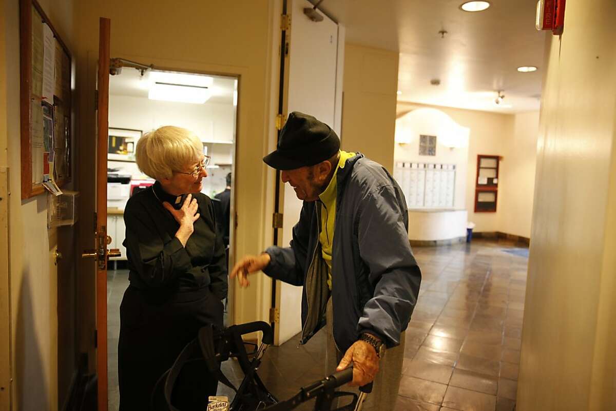 Rev. Glenda Hope (l to r) and resident Yuri Dubrovsky talk at a low income housing unit on Ellis Street on Wednesday, August 28, 2013 in San Francisco, Calif.
