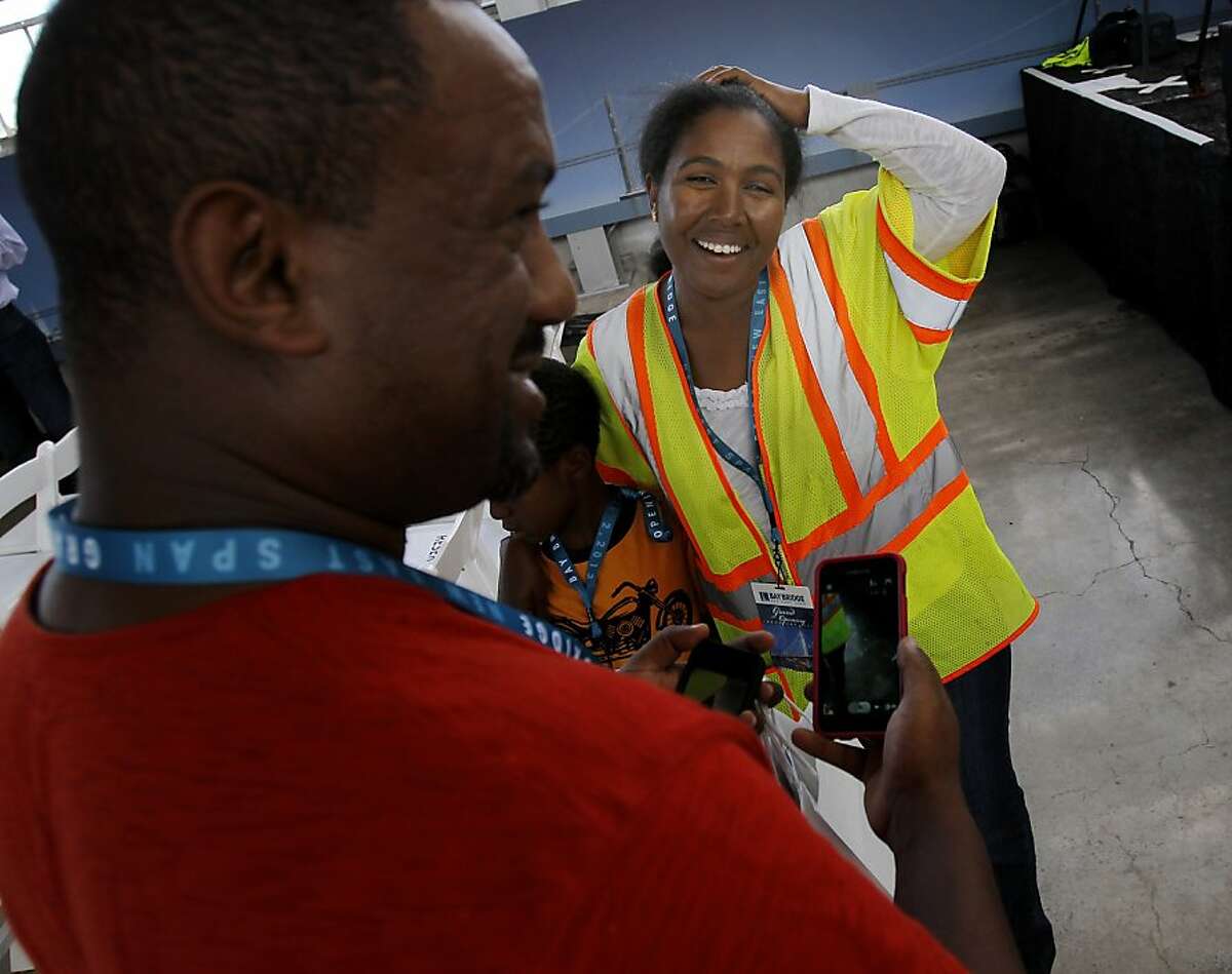 Masti Bogale, a bridge inspector, attended the event with her family Monday September 2, 2013. The celebration for the opening of the eastern span of the Bay Bridge began with a ceremony in the Bridge Yard building near the toll plaza.