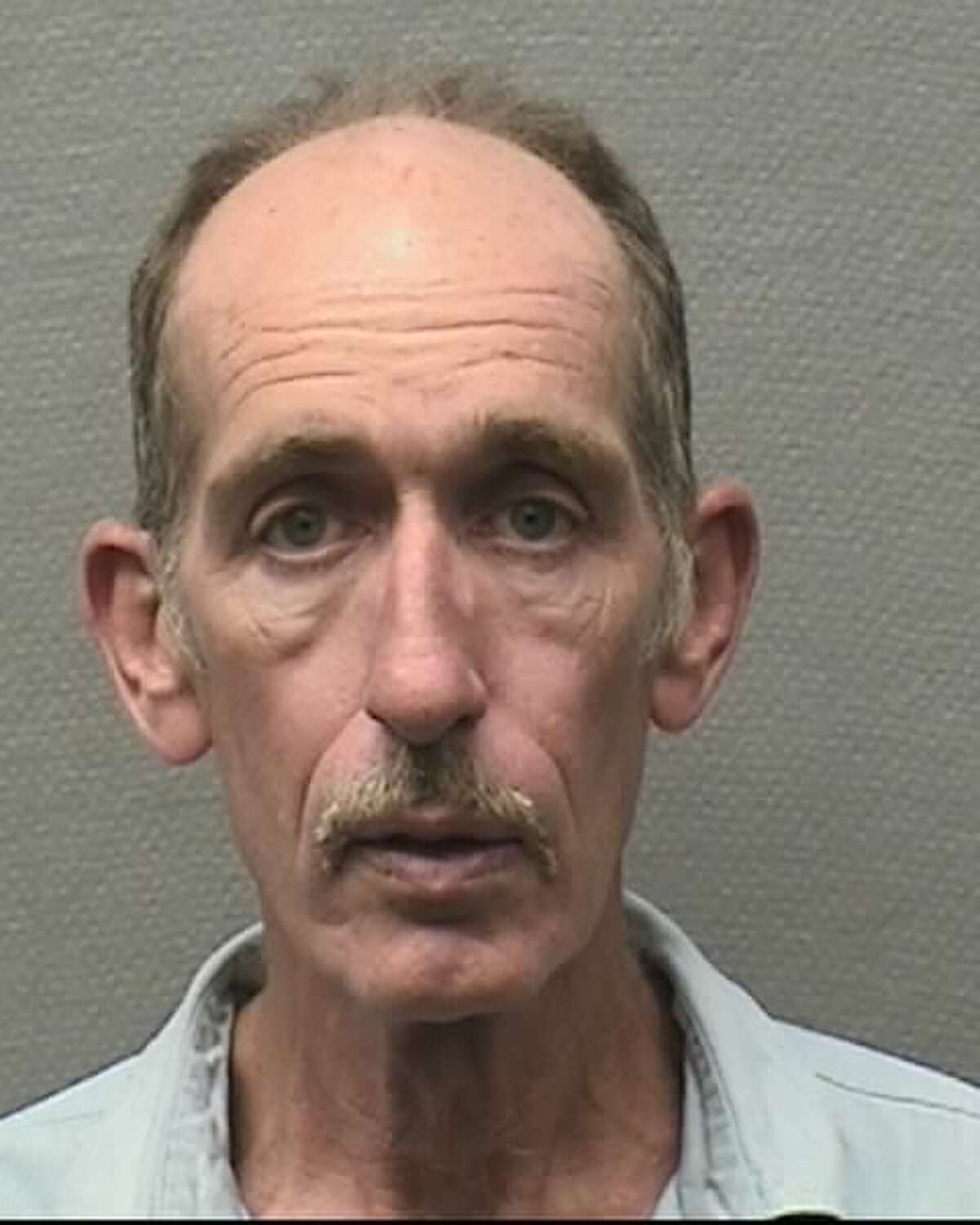 Robert Barton Porter Jr., 58, is charged with aggravated robbery with a deadly weapon.