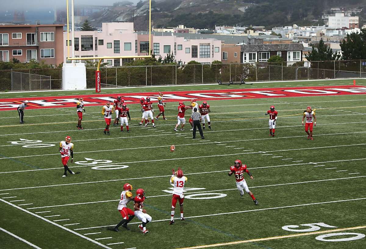 Berkeley senior Jakari Simpson, #13, makes an interception at Washington High School on August 31, 2013 in in San Francisco, Calif. Washington played Berkeley to a 40-8 loss in the first game of the season.