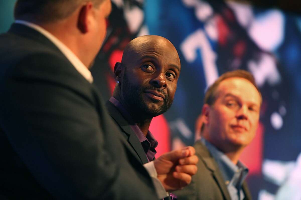 Intel Corp hosts a panel discussion on "The Intersection of Football, Big Data and Technology" with Intel's VP and GM Boyd Davis (left) of the Datacenter Software division, NFL legend and hall of famer Jerry Rice (middle) and GM John Pollard (right) of Sports Solutions group of STATS at Pedro's Cantina in San Francisco, California on Wednesday, August 28, 2013.