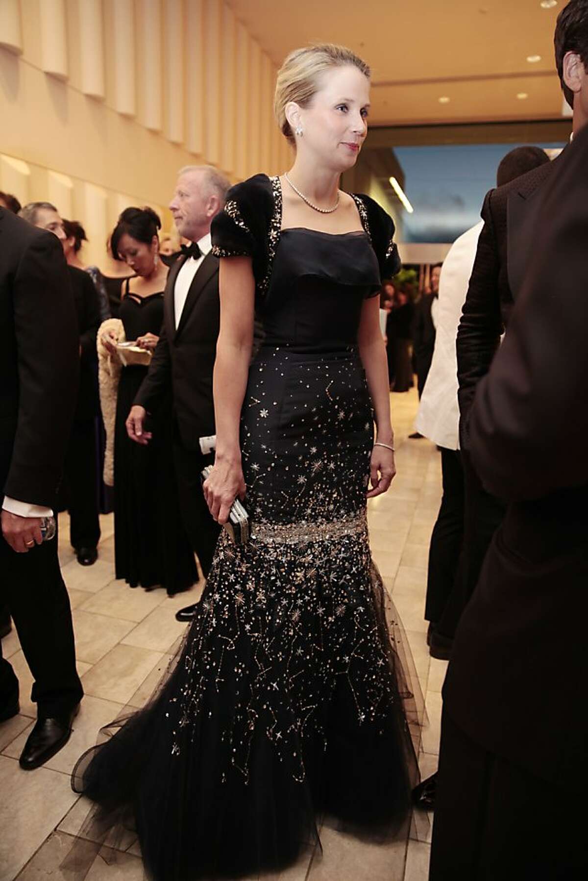 Attire 2.Take care with your appearance. This is not the night to change at the office, as if going to a cocktail party in business casual. Pictured: Yahoo CEO Marissa Mayer attends the 102nd San Francisco Symphony Gala in San Francisco Calif. on Tuesday, Sept. 3, 2013.