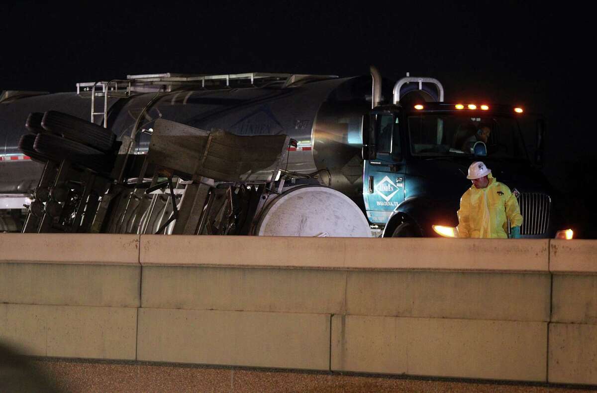 Cy-Fair fire department is on the scene along with Harris County Hazardous Materials crew continue to clean up a chemical spill that occurred at 9 p.m. on 290 north bound on Tuesday, Sept. 3, 2013, in Houston. Traffic is taking the Mueschke Road exit and riding feeder road north 290.