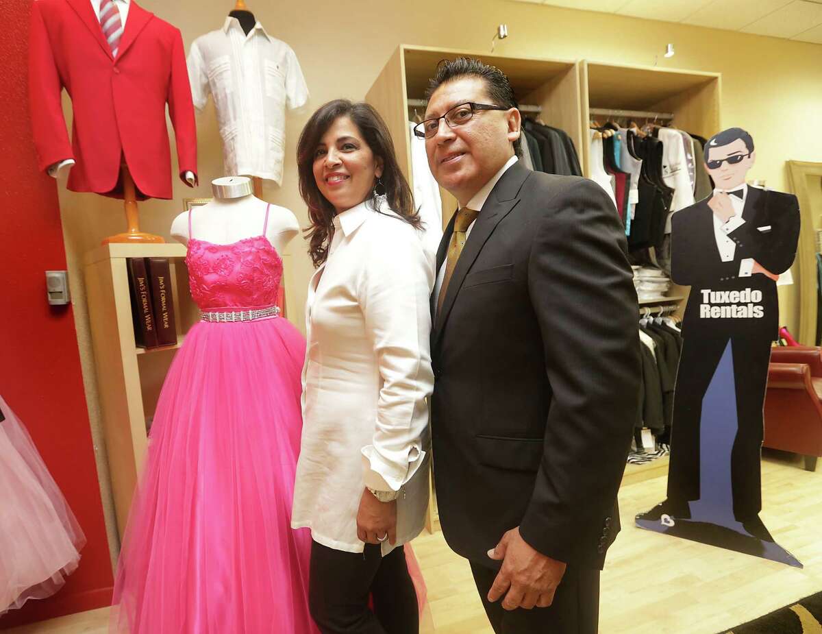 Phil Zavala, right, and his wife Rosy Garza-Zavala, own Image Avenue Clothiers in Wonderland of the Americas Mall. They take custom orders, perform alterations, and handle rentals too. Monday, August 19, 2013.