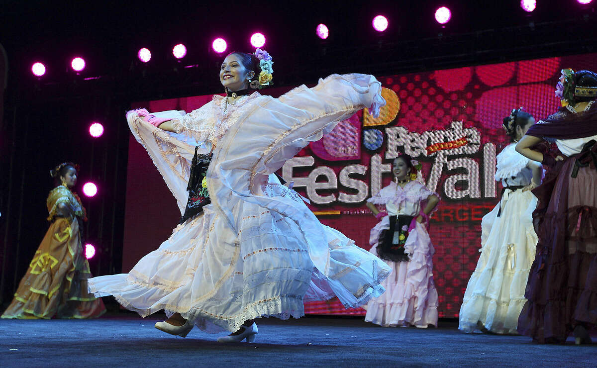 Dancers from the Guadalupe Dance Academy perform for the opening ceremonies of Festival People en Español at the Henry B. Gonzalez Convention Center on Aug. 31.