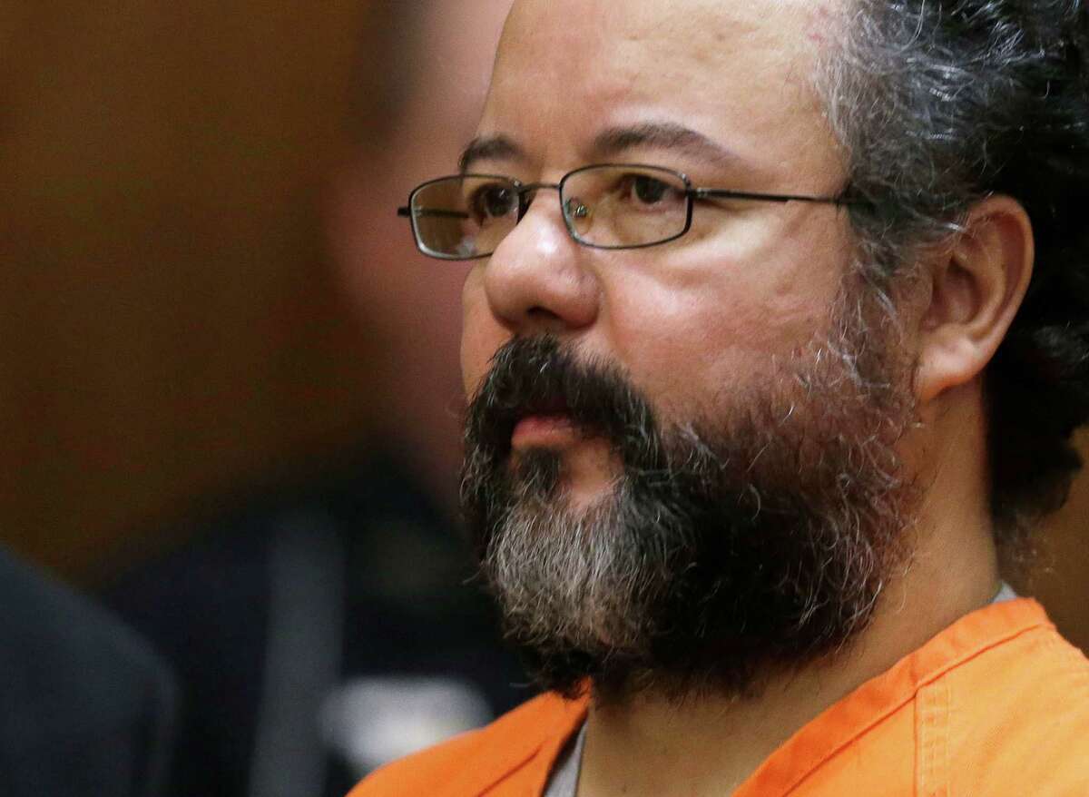 FILE - This Aug. 1, 2013 file photo shows Ariel Castro in the courtroom during the sentencing phase in Cleveland. Castro, who held 3 women captive for a decade, has committed suicide, Tuesday, Sept. 3, 2013. (AP Photo/Tony Dejak, file)