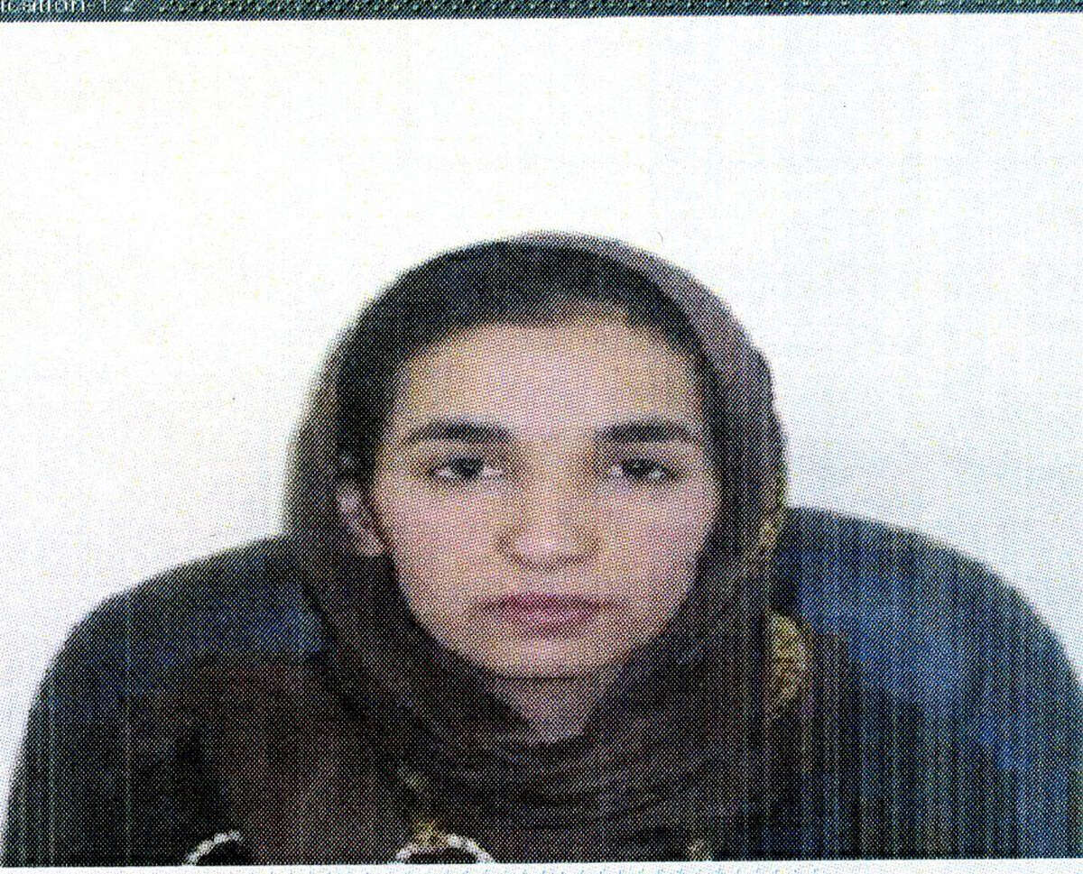 This file image provided by Interpol shows an undated photo of Shokofa Salehi.The young woman worked for three years at the Afghan bank, officials say. Then one day she vanished. As did $1.1 million. Afghan authorities have been scrambling to track down the suspected thief and at least nine other alleged accomplices, and an international arrest warrant has been issued. (AP Photo/Interpol, File)
