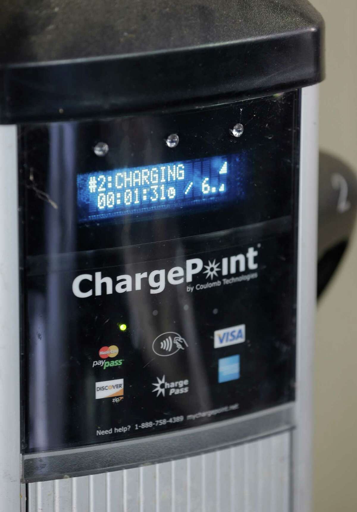 This Sept. 4, 2013 photo shows the screen of a charge point for a new electric rental car in Orlando, Fla. On Thursday, Sept. 5, Orlando will be home to a first-of-its-kind electric rental car initiative where hotel partners will valet park the electric rental for free and charge it for you. Orlando already has more than 300 stations in the area. (AP Photo/John Raoux)