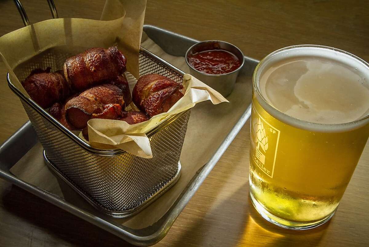 The Lil Smokies with an Upright Engelberg Pilsner at Mikkeller restaurant in San Francisco , Calif., is seen on Thursday, August 29th, 2013.