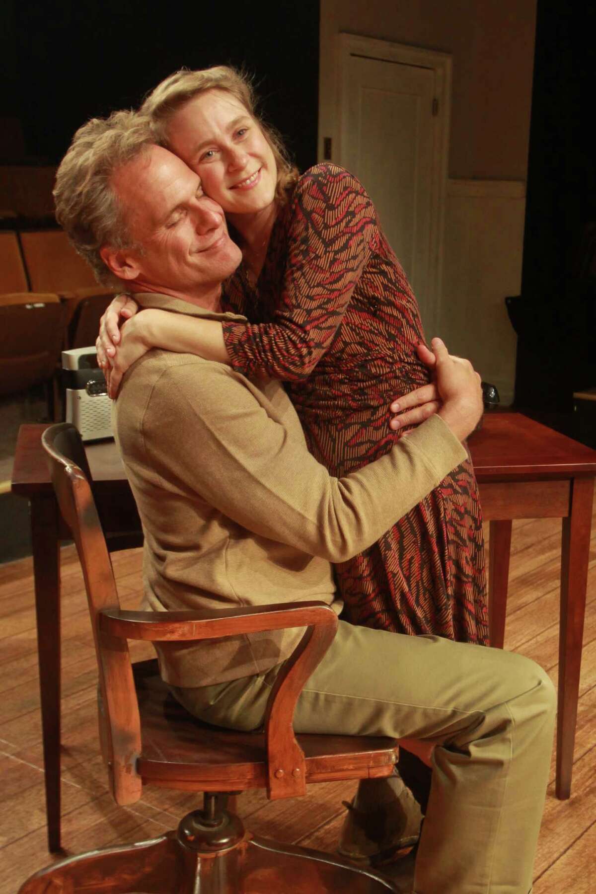 (For the Chronicle/Gary Fountain, August 25, 2013) Joe Kirkendall as Henry, and Shannon Emerick as Annie, in this scene from Main Street Theater production of Tom Stoppard's "The Real Thing."