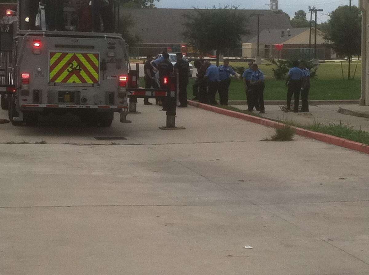 SWAT scene ends with armed suspect pulled from vent in Houston store