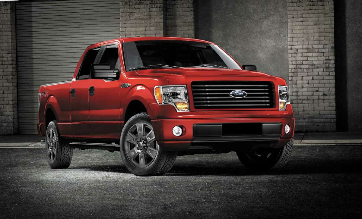 This undated photo provided by Ford shows the 2014 Ford F-150 STX SuperCrew truck. Americans are paying record prices for new cars and trucks, and they have only themselves to blame. The average sale price of a vehicle in the U.S. hit $31,252 last month, up almost $1,000 over the same time last year, a sharp increase driven by consumers loading cars up with high-end stereos, navigation systems, leather seats and safety gadgets. Many in the business think prices will moderate some because people who kept their cars through the recession and haven't replaced them yet won't load up on options. Ford will try to please them this fall by adding a four-door cab to its F-150 STX line. Previously, the STX only came with a two-door cab. (AP Photo/Ford)