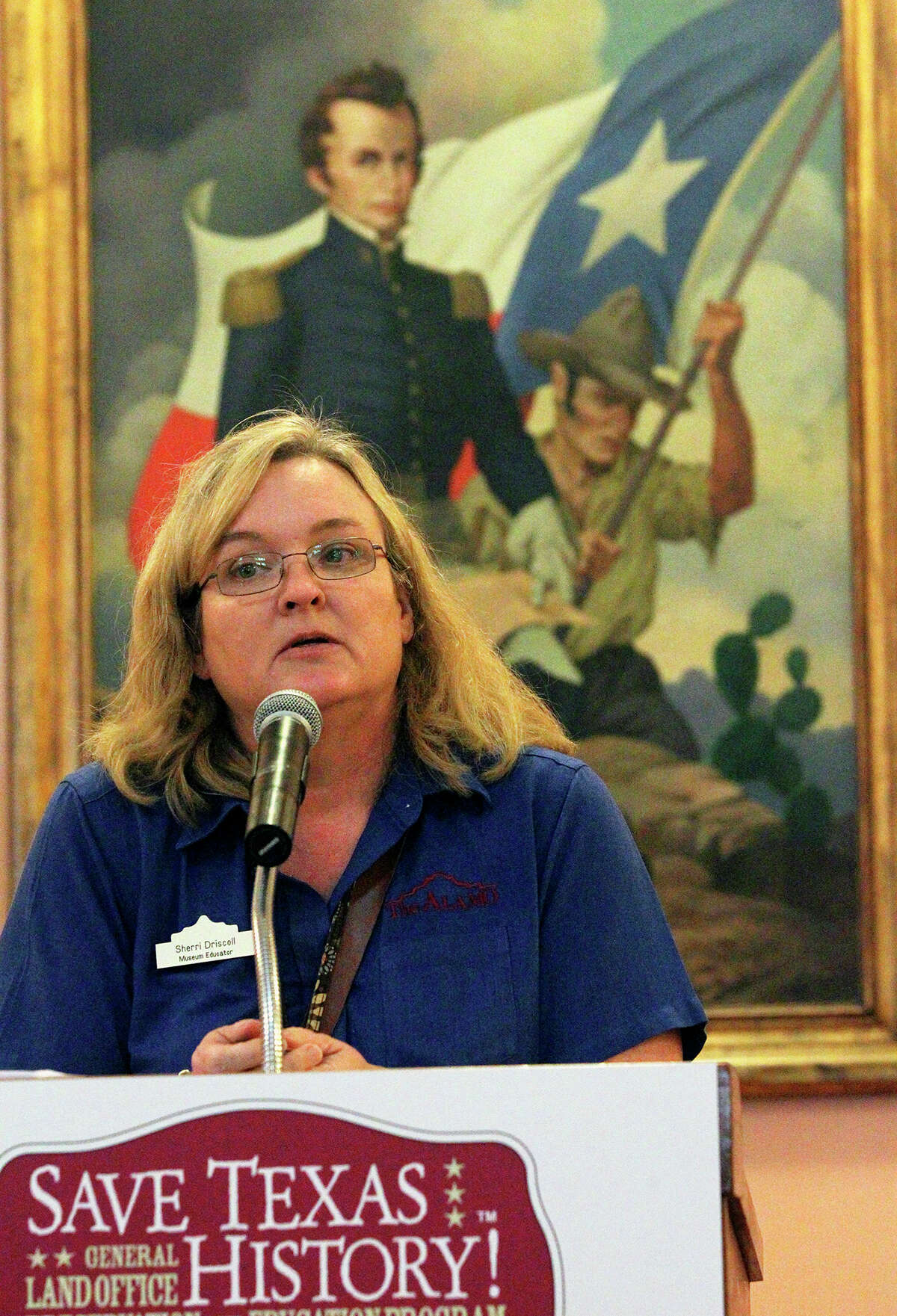 Sherri Driscoll, Museum Educator, starts visitors on a tour during the Save Texas History symposium hosted by theTexas General Land Office on September 7, 2013.
