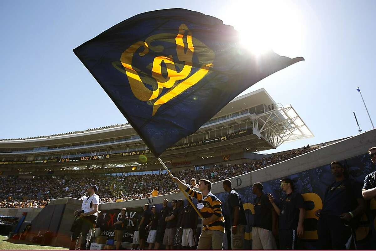 A flag is waved after Cal scored a touchdown in the second quarter as the California Golden Bears play the Portland State Vikings at Memorial Stadium in Berkeley, CA Saturday September 7, 2013.