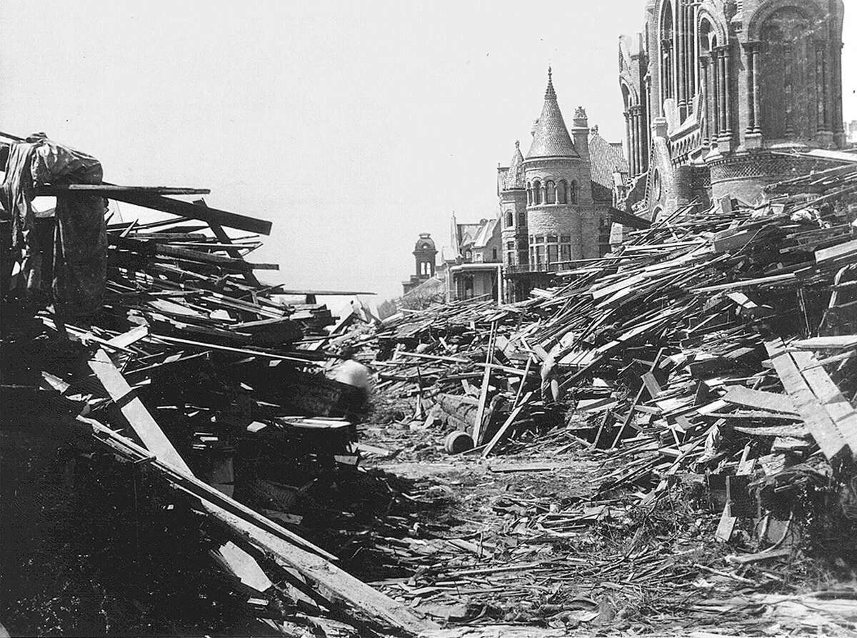 1900 Galveston hurricane The Gresham house, center, now known as the Bishop's Palace, sits relatively unscathed behind a wall of debris following the hurricane that devastated Galveston.